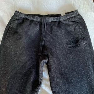 Womens ROOTS track pants/sweats black pepper. Size Large. gently worn